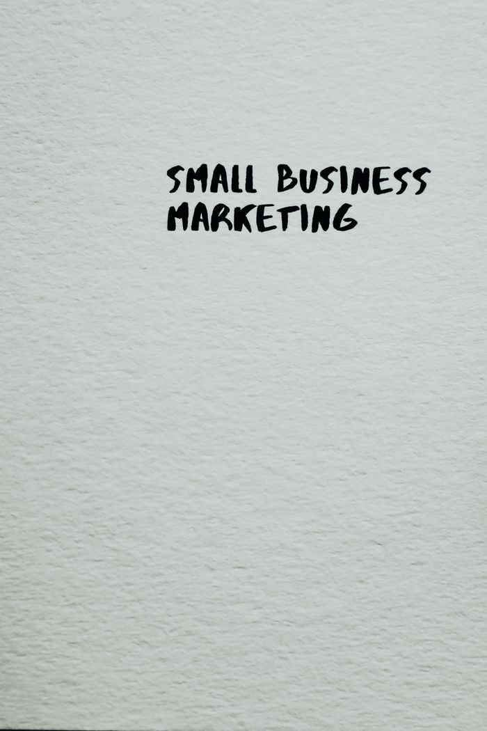 service-04 Text reading 'Small Business Marketing' on a textured background, perfect for business and marketing themes.